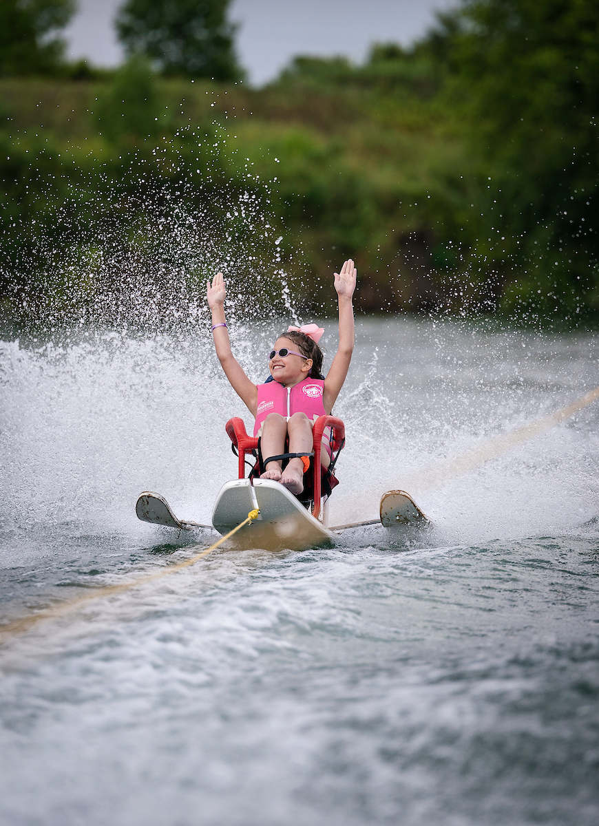 A Gillette patient participates in water sports.