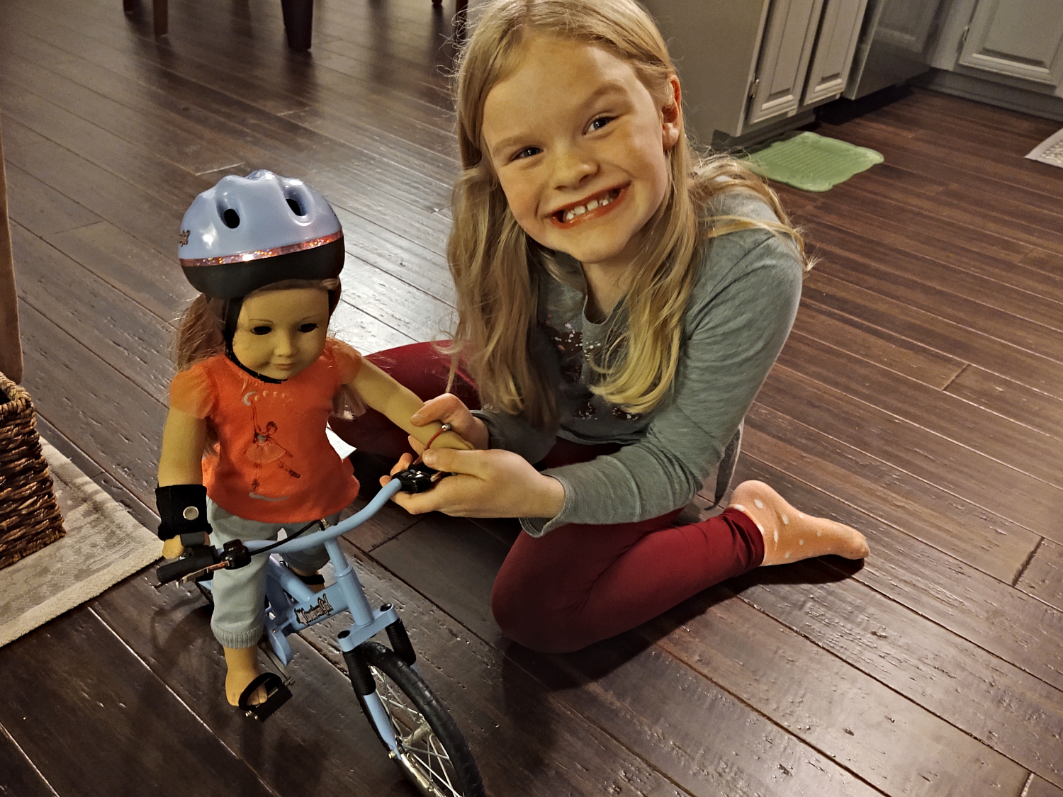 Mari, her doll and her bike