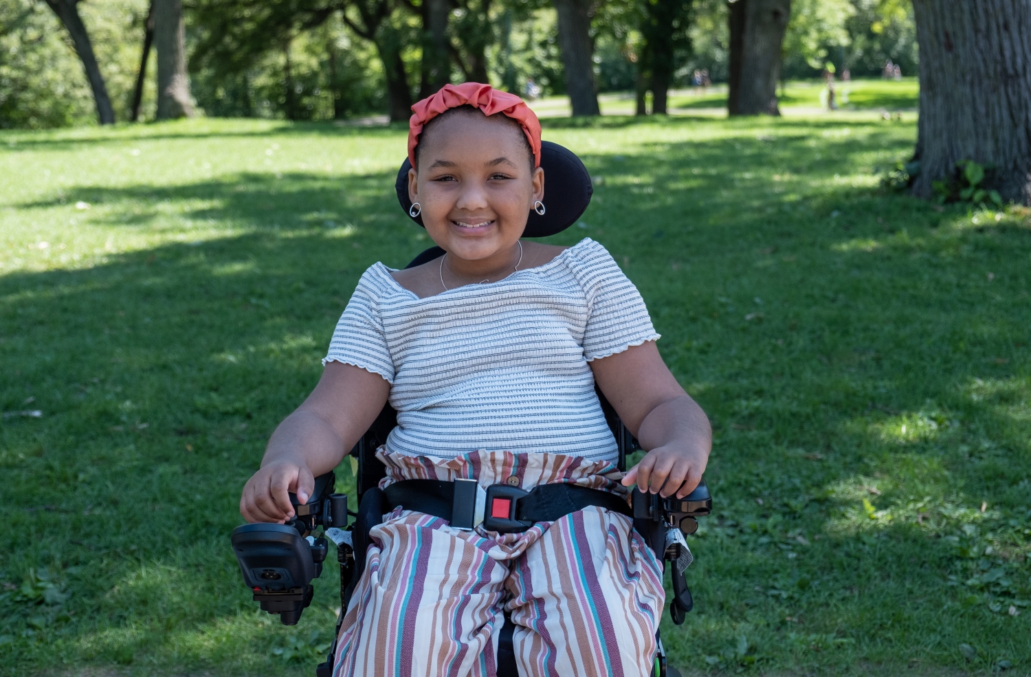 Za'Nii in her power wheelchair