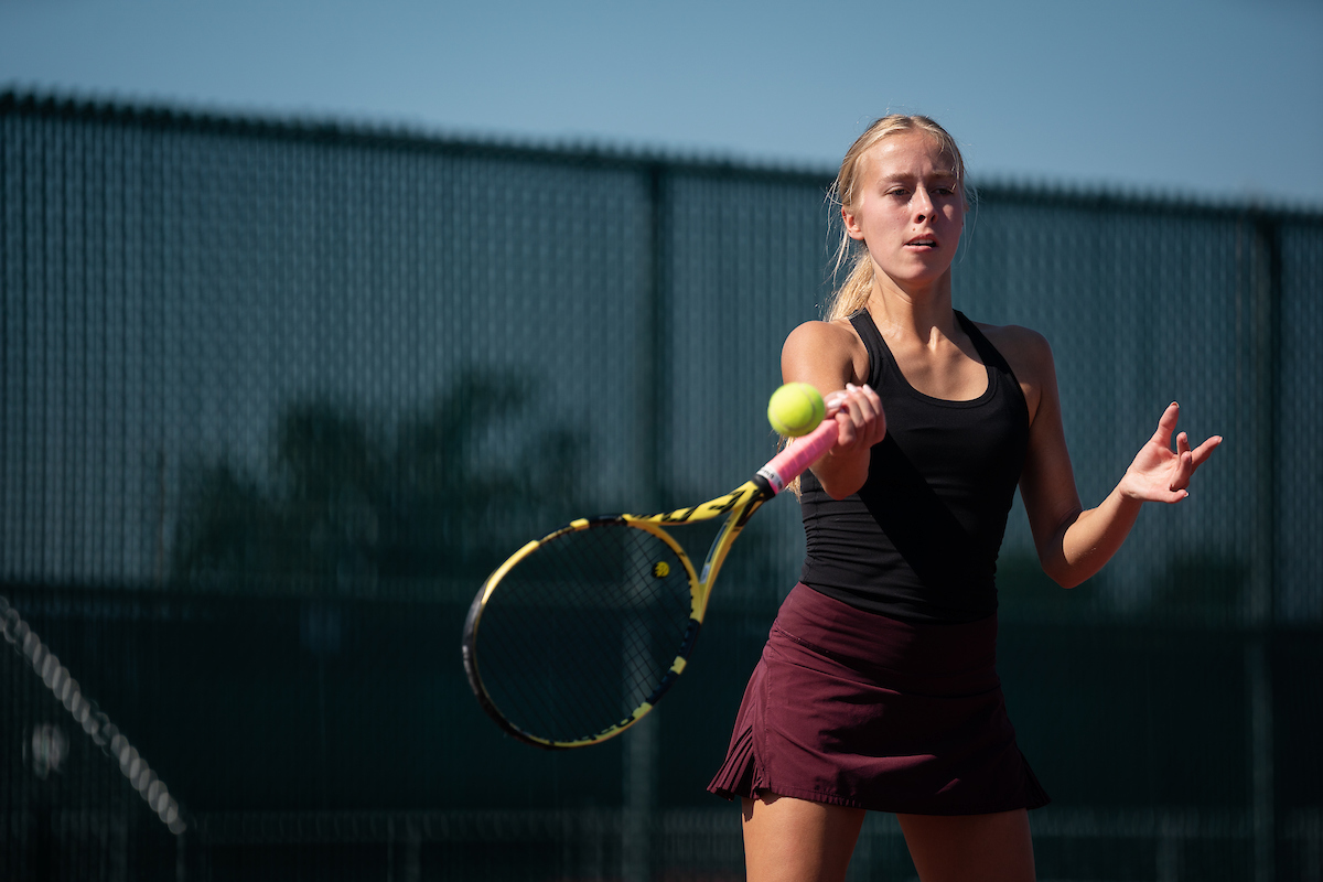 Gillette Children's spine patient, Delaney Lundquist plays tennis.