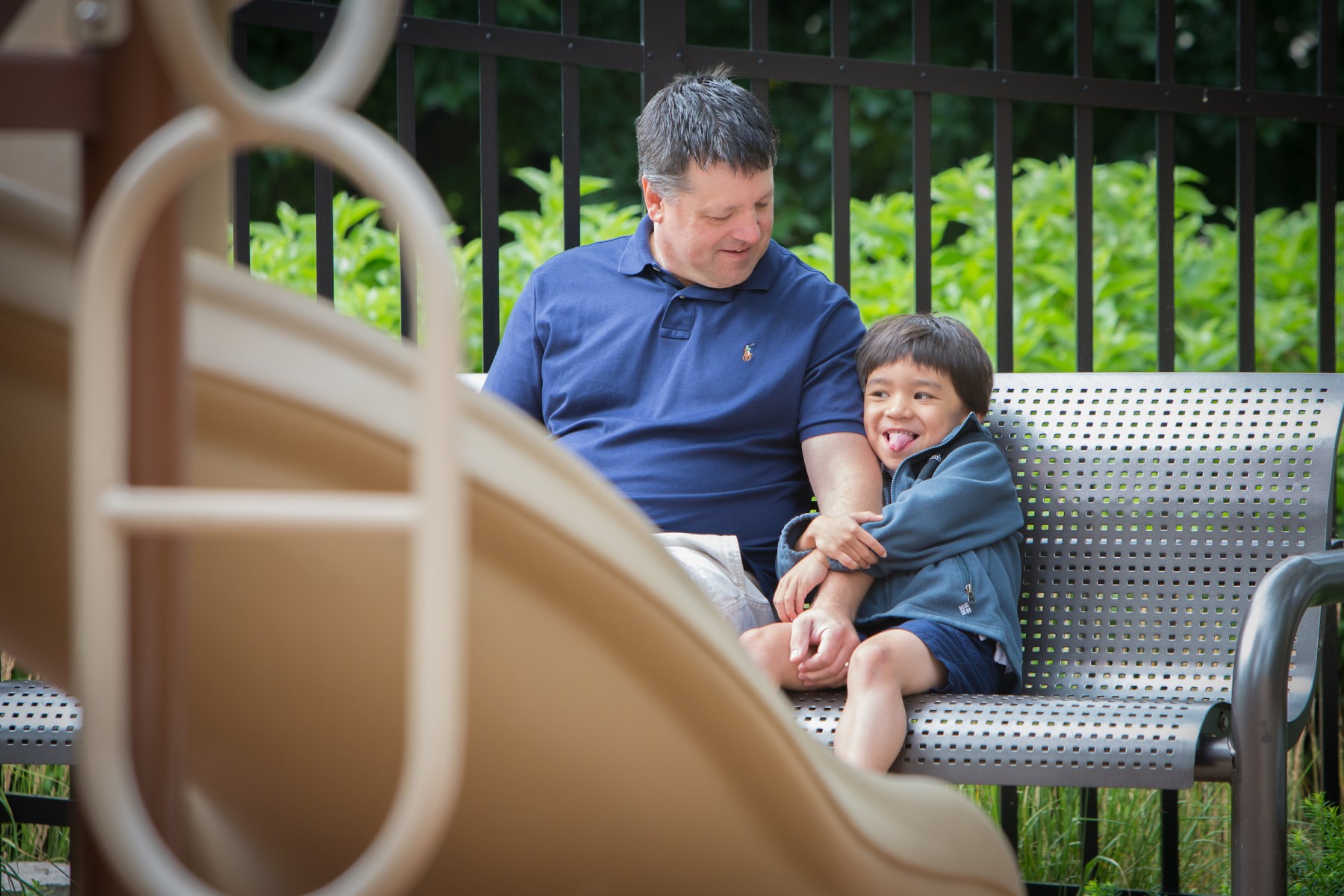Ash Tyler, a Gillette Children's patient, plays at playground
