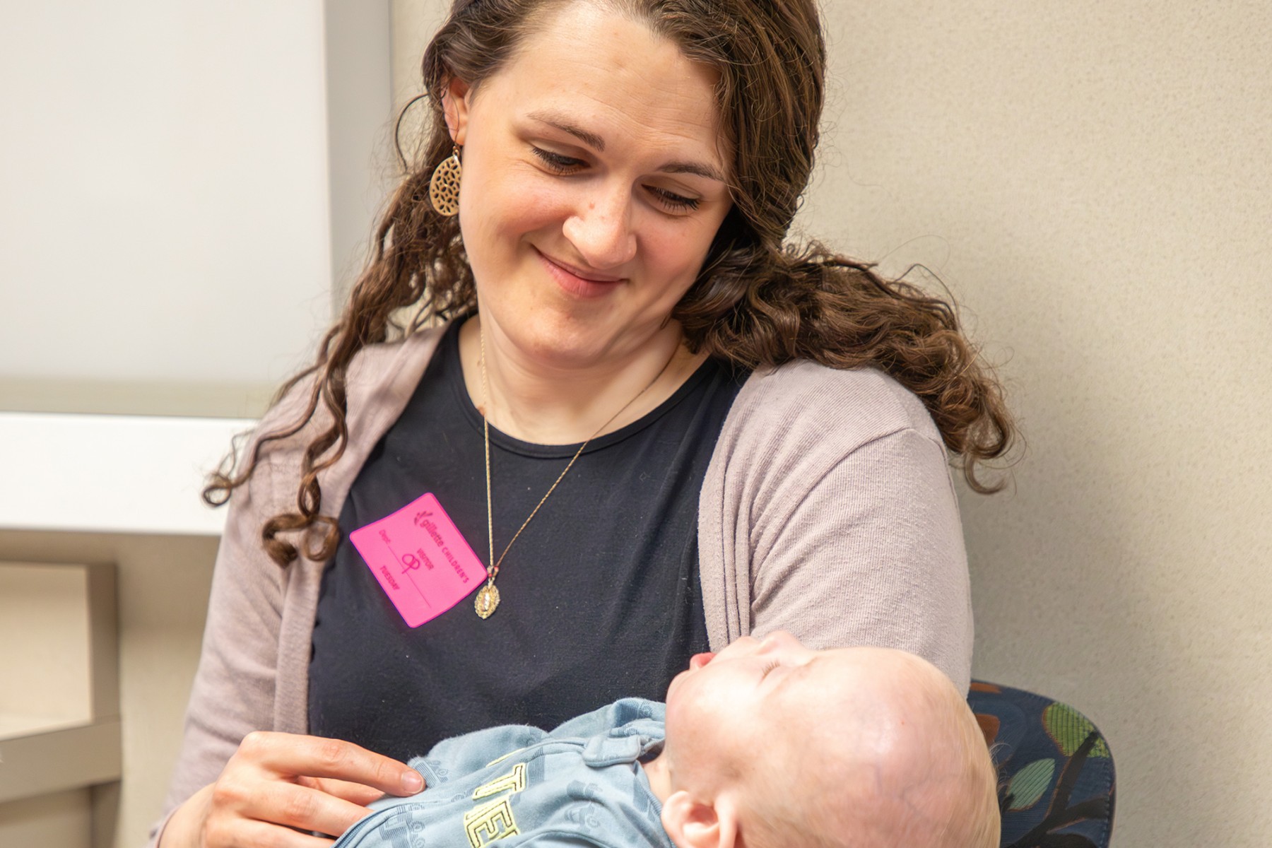 Gillette Children's patient, Matthew, with his mother during a clinic exam