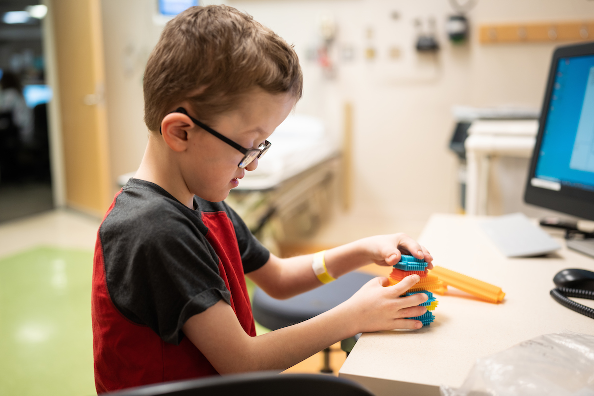 A Gillette Children's patient with Apert syndrome during clinic visit