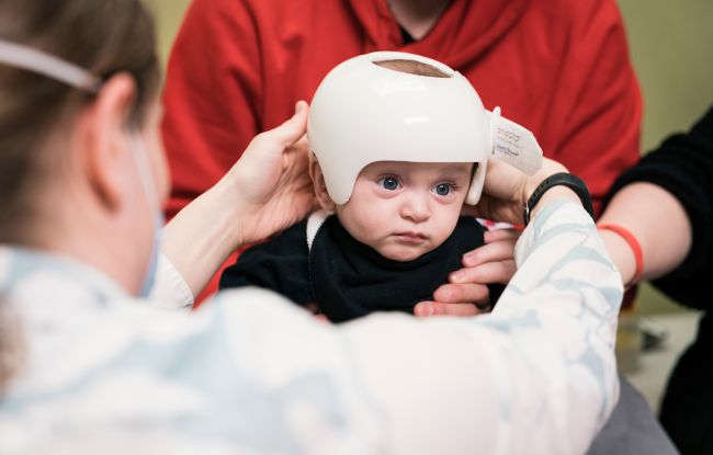 Gillette Children's patient during a CranioCap fitting