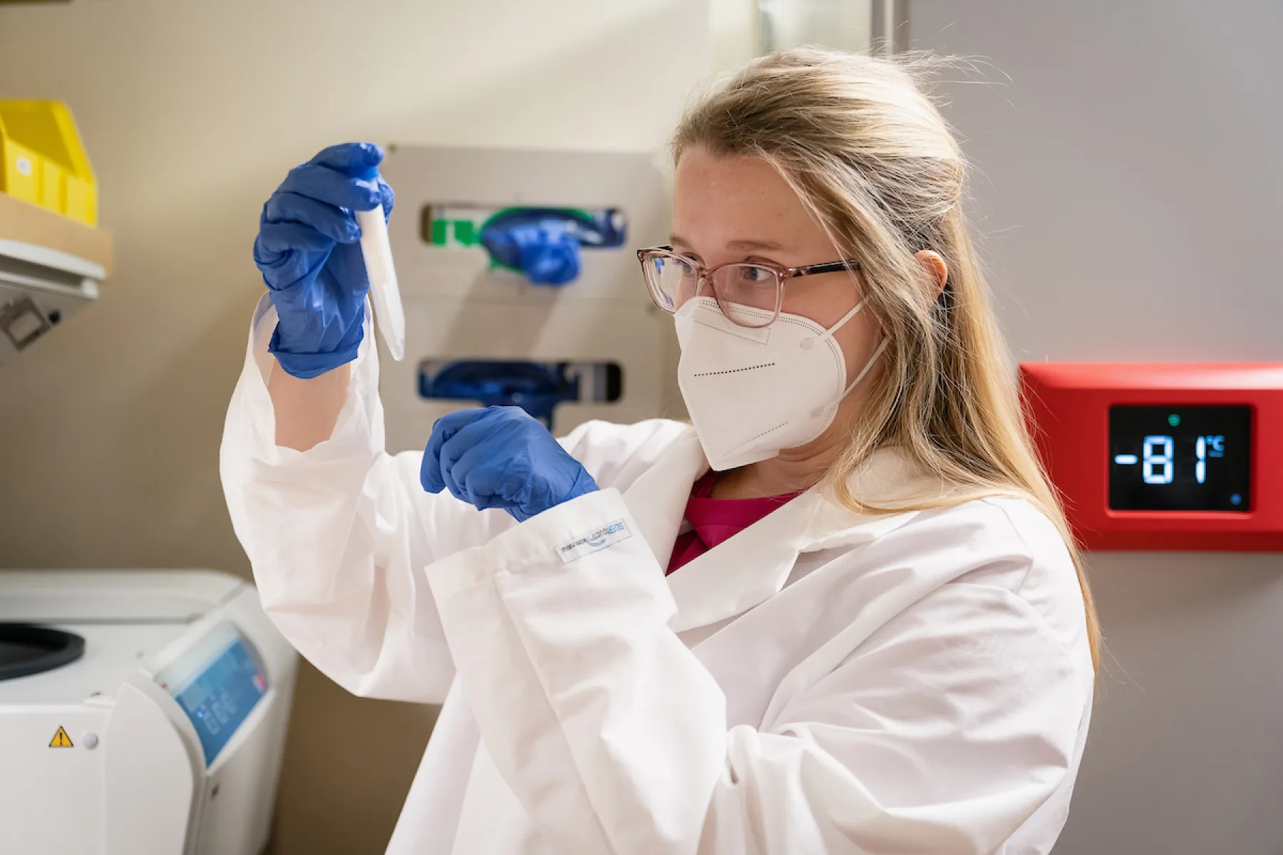 Scientist looking at sample.