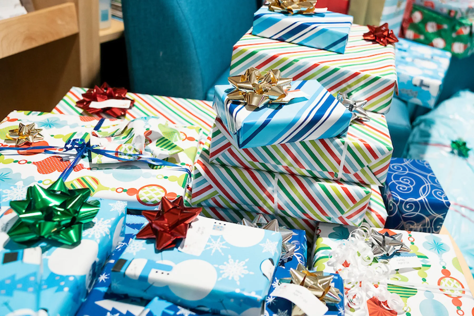 Stack of wrapped presents - Gillette Children's.