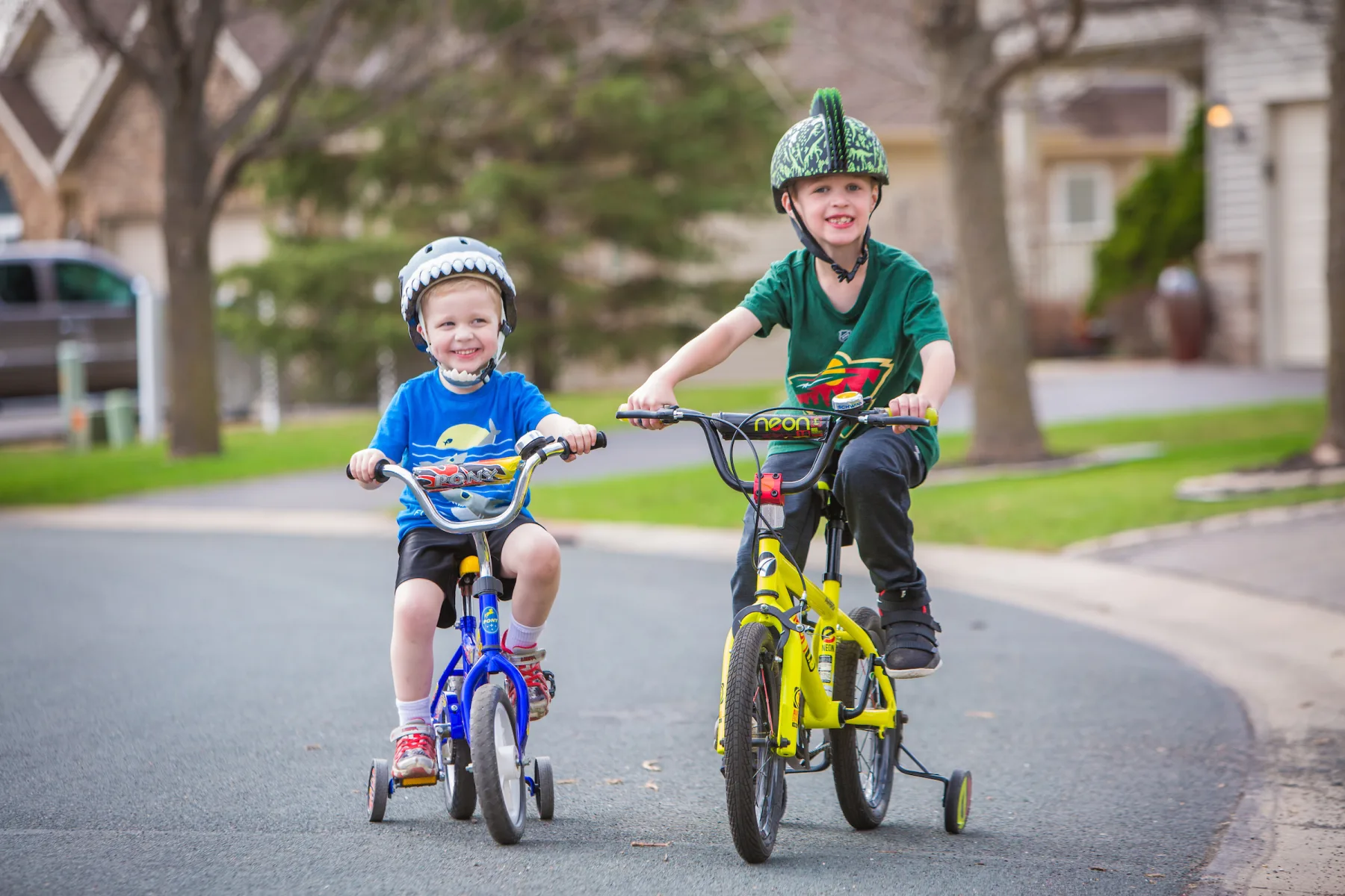 Gillette Children's patient Luke Olson enjoys riding his bike with this sibling after having a brain injury.