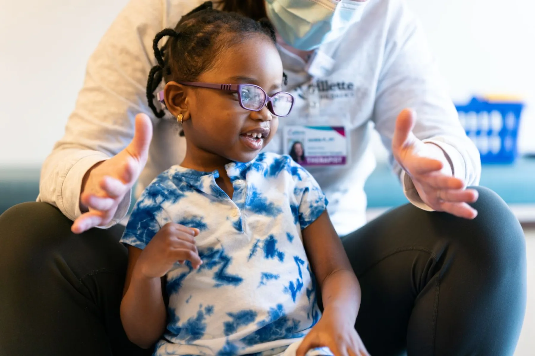 Gillette Children’s Rehabilitation physical therapy (PT) patient Hadiyah works with care team.