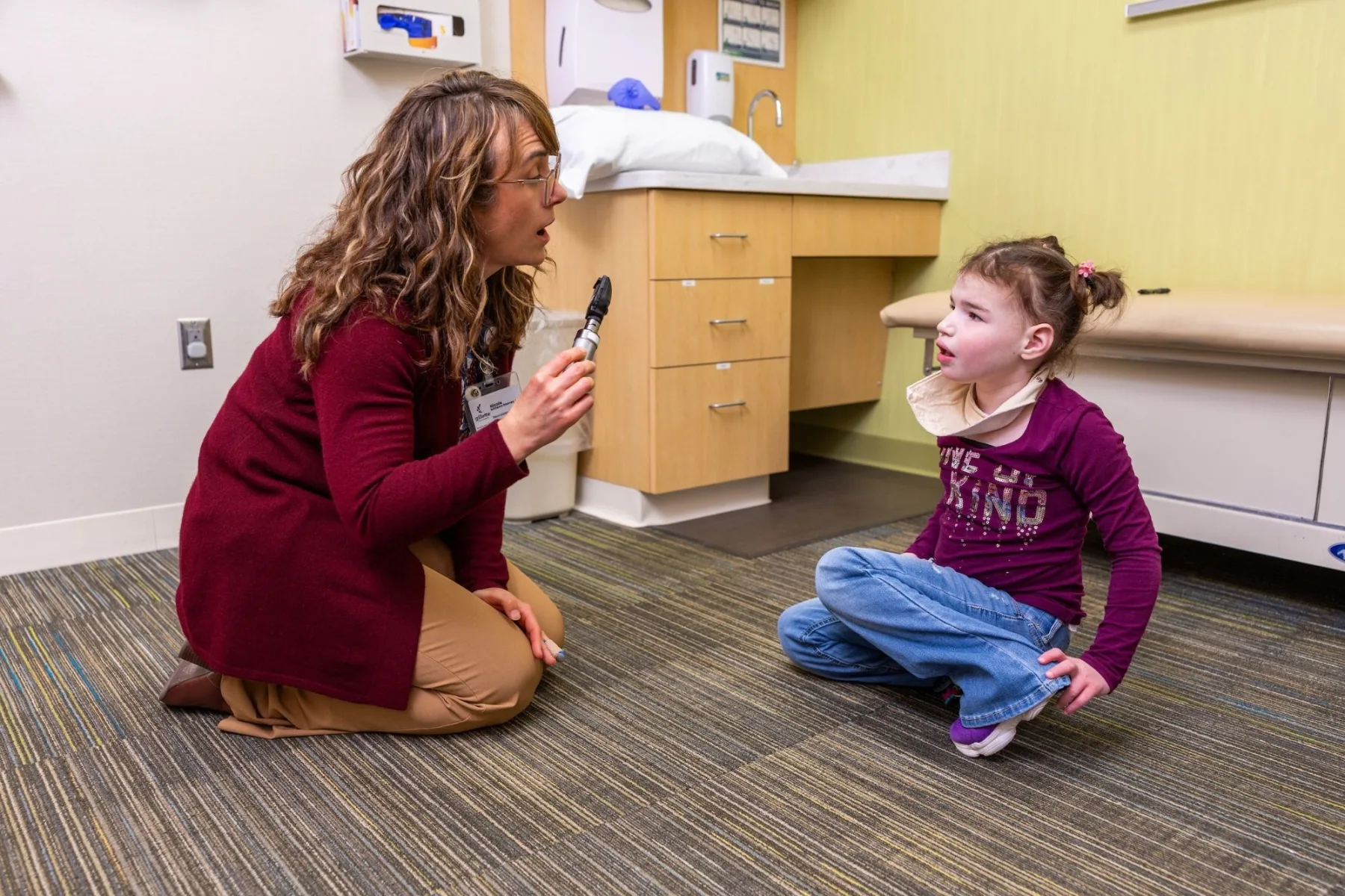 Dr. Nicole Williams Doonan examines patient Lilah Schwab in the Gillette Children's Keto Diet Clinic.