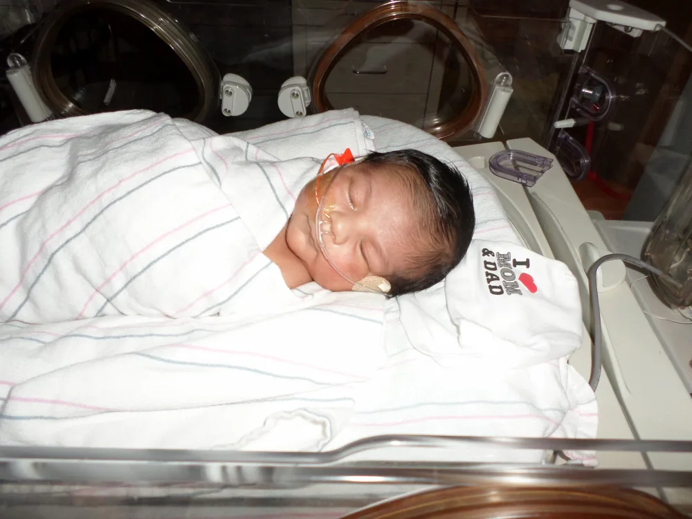 Mateo at 9 days old with Gillette Children's.