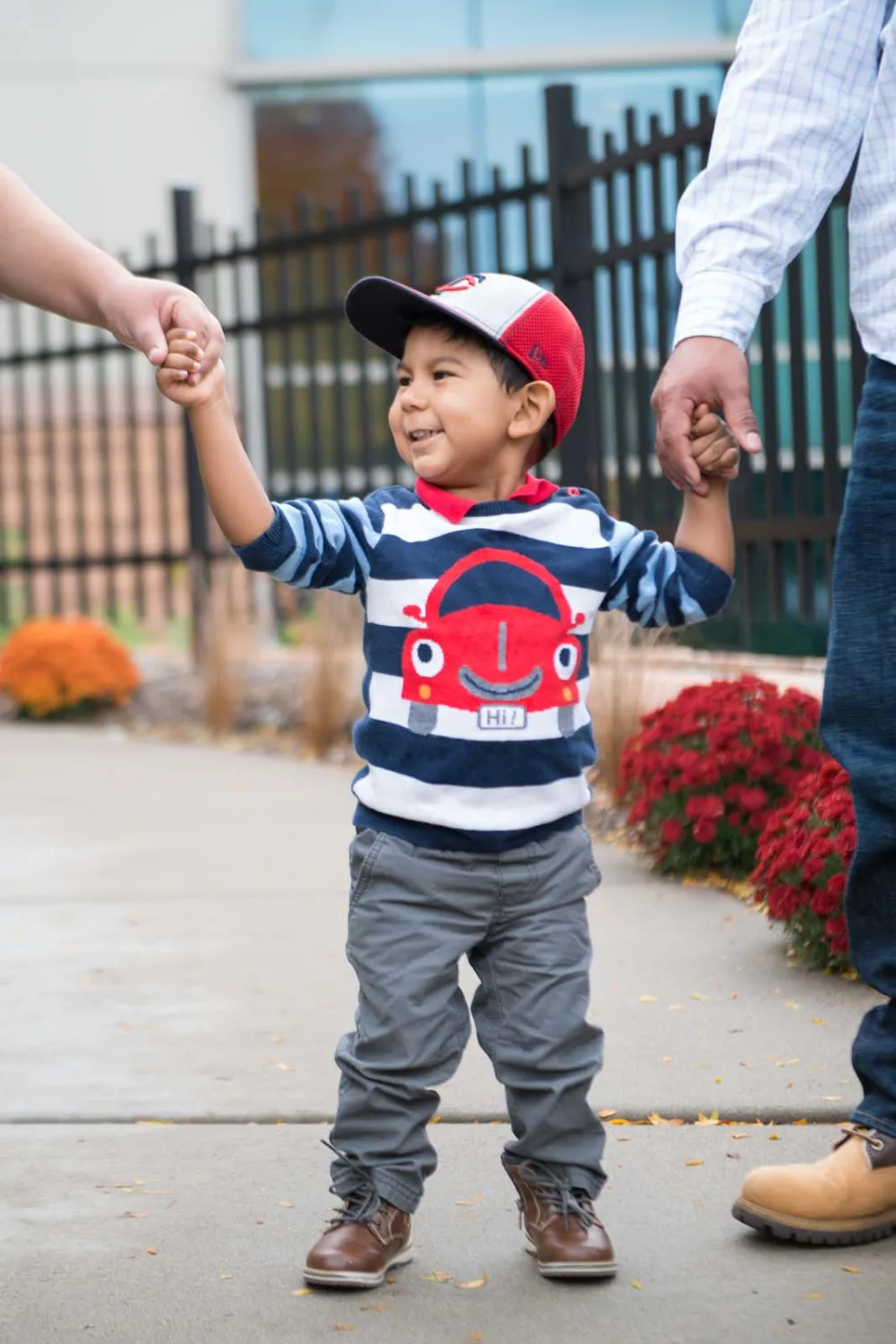 Mateo holds hand at Gillette Children's.