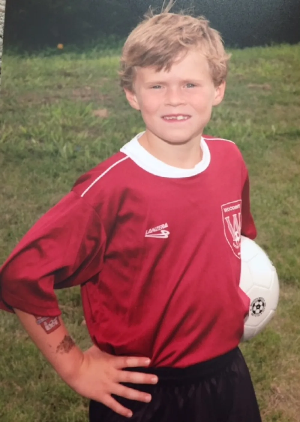 Photo of George playing soccer with Gillette Children's.