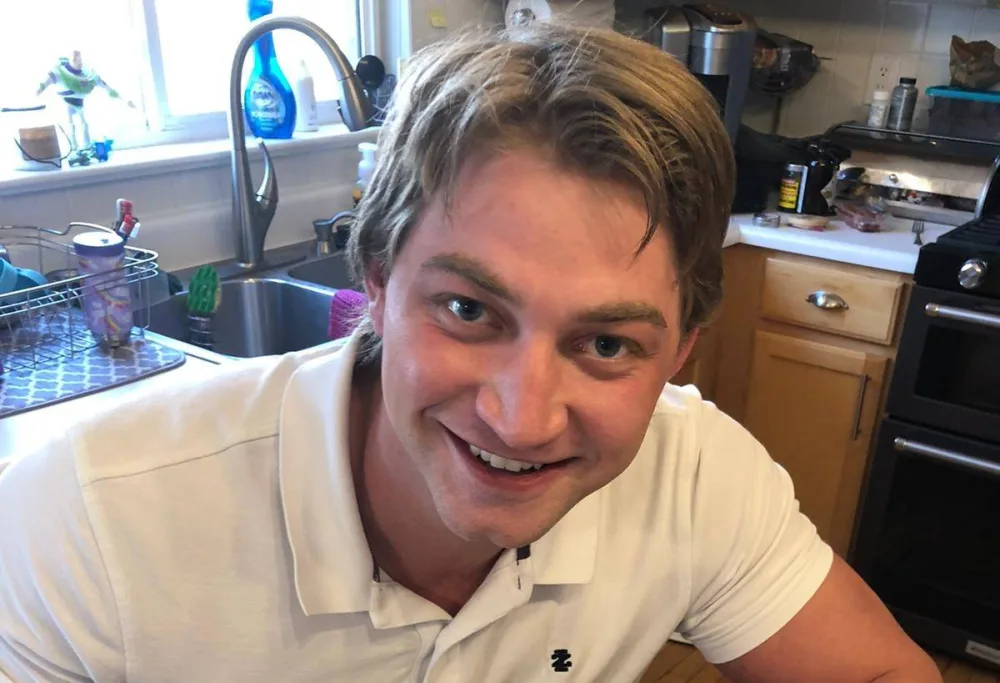 Matthew smiles with Gillette Children's.