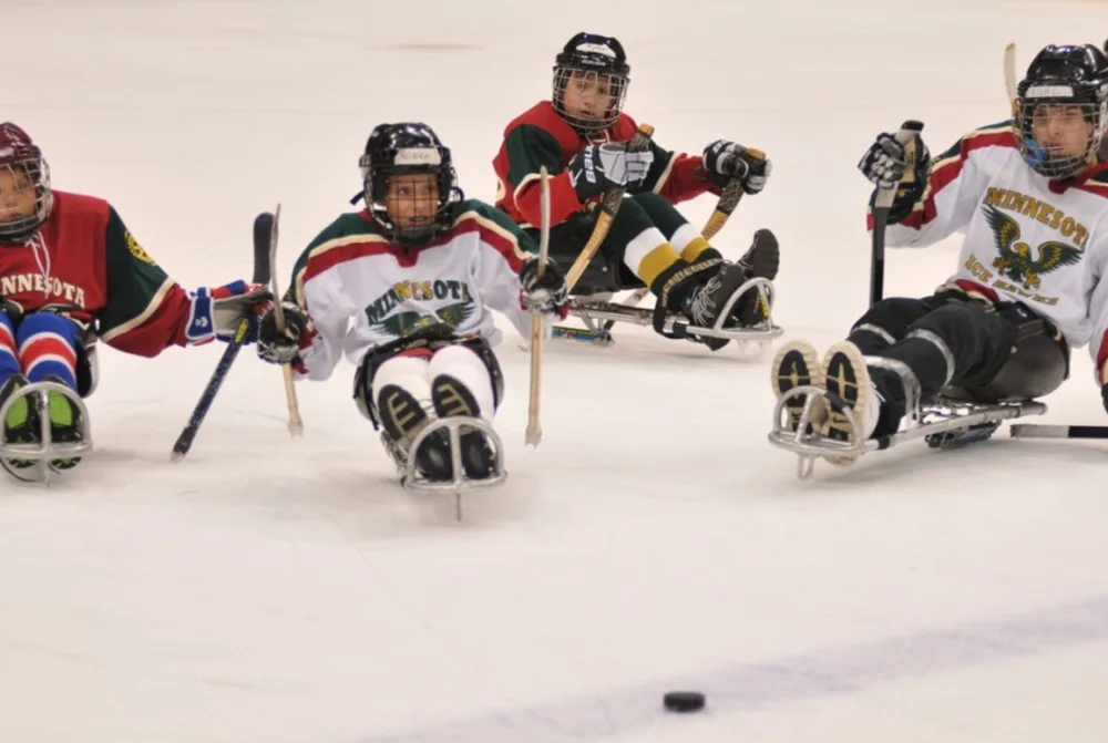 Photo of sled hockey in action at Gillette Children's.