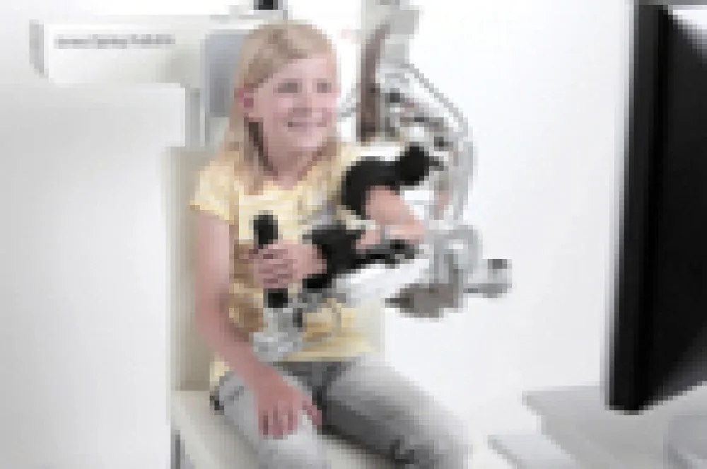 Patient using the armeo spring.