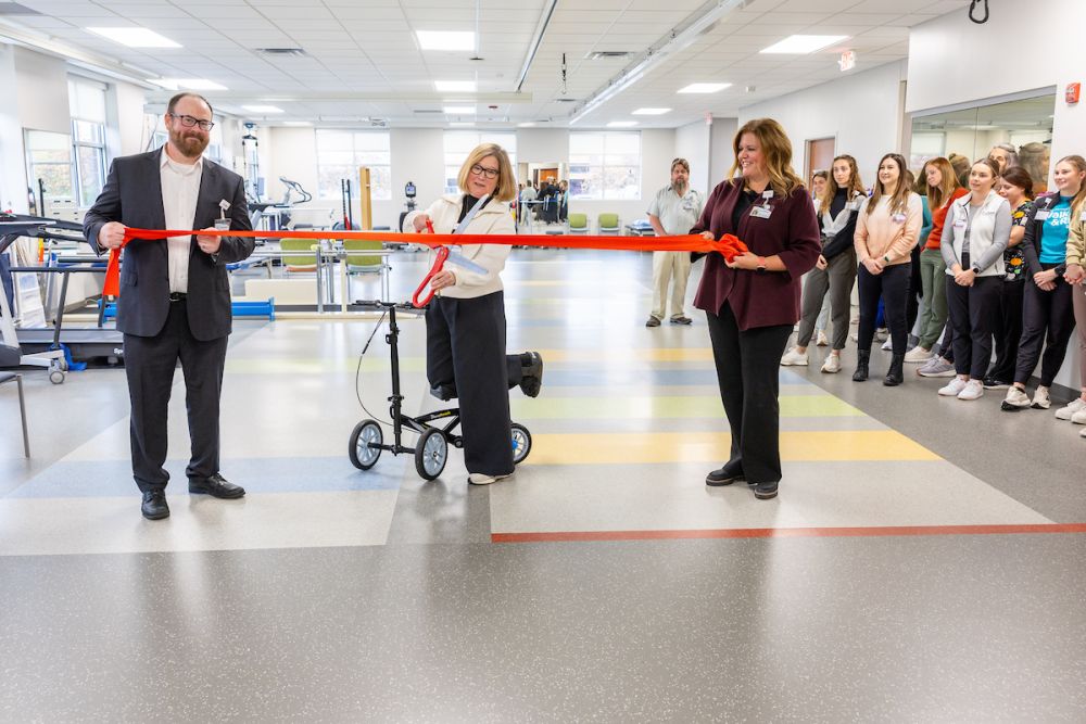 Gillette Leadership cutting the red ribbon at the Maple Grove Rehab Expansion Ribbon Cutting Ceremony