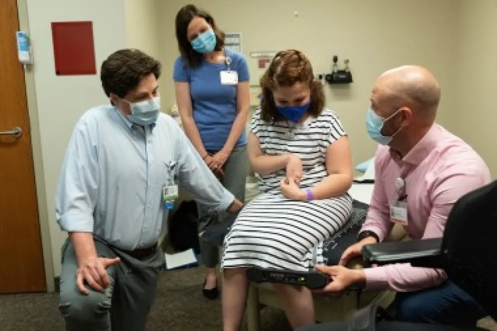 Providers with patient  - Gillette Children's.