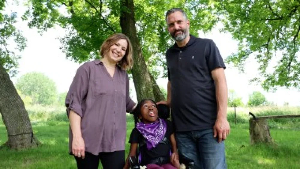 Gillette Children's patient, Angelina, with her parents.