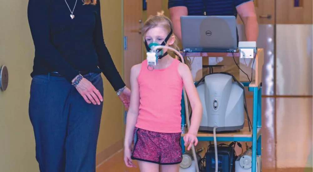Child performing oxygen consumption test  - Gillette Children's.