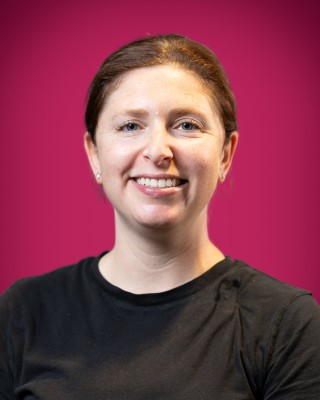 Portrait of Brittani Berg smiling.