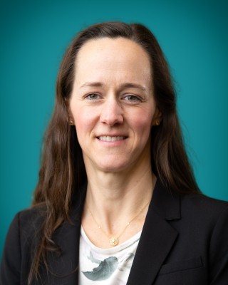 Portrait of Dr. Lewallen smiling.