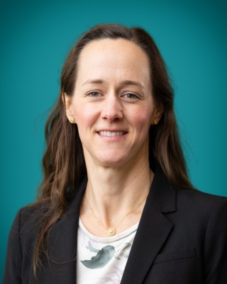Portrait of Dr. Lewallen smiling.