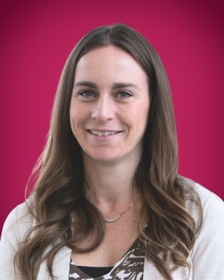 Portrait of Erica Suski smiling.