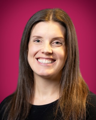 Portrait of Heather Ardner smiling.