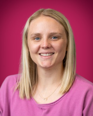 Portrait of Rebecca Pilet smiling.