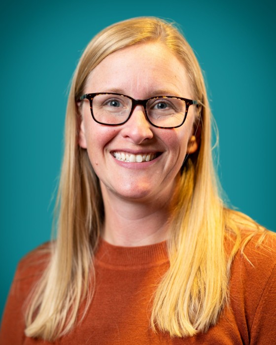 Portrait of Amy Jo Beebe smiling.