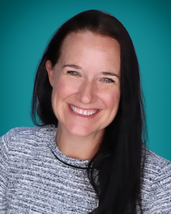 Portrait of Dr. Alison Schiffern, MD warmly smiling.
