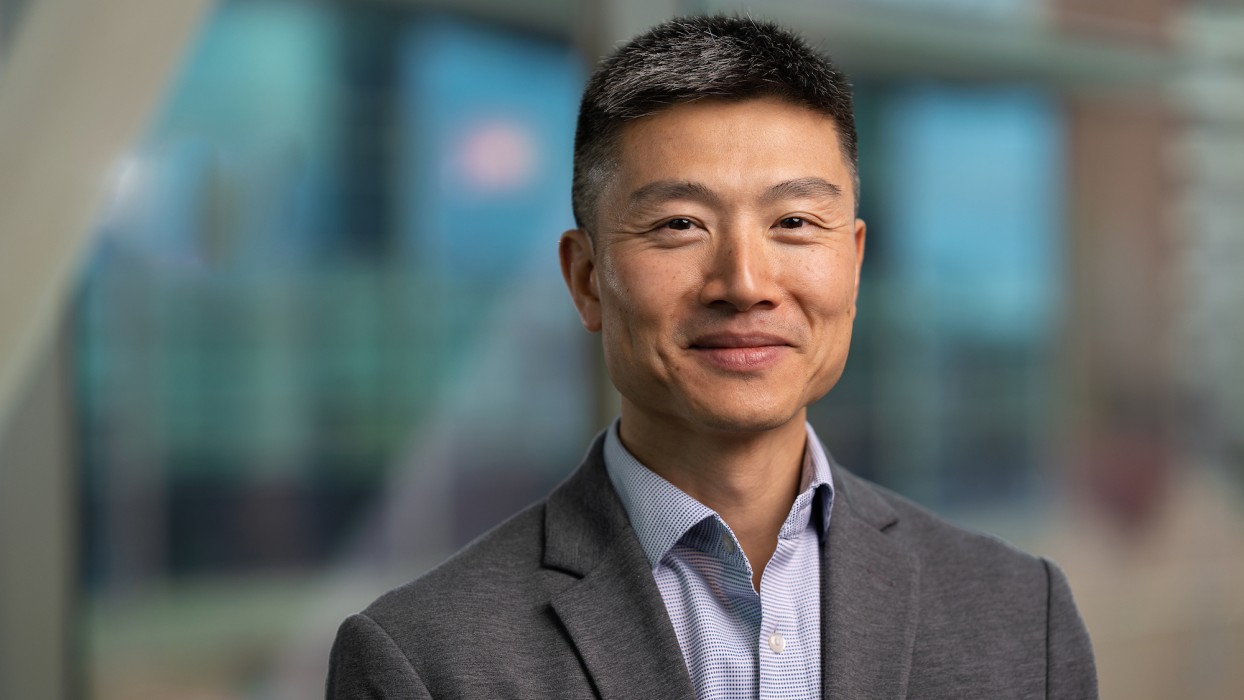 Dr. Walter Truong smiles warmly in the Gillette skyway.