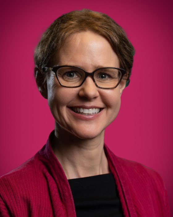 Portrait of Kelli Moberg smiling.