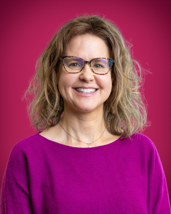 Portrait of Kelli Moberg smiling.