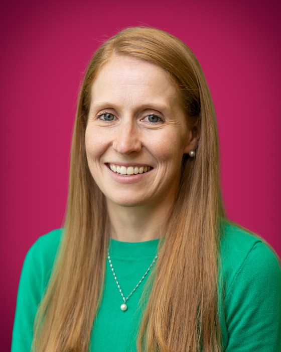Portrait of McKenzie Johnston smiling.