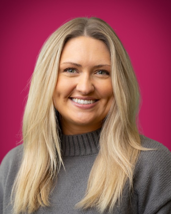 Portrait of Montana Nelson smiling.