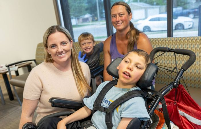 Dr. Andrea Paulson meets with a patient and their family at the Gillette Children's clinic in Alexandria, Minnesota.