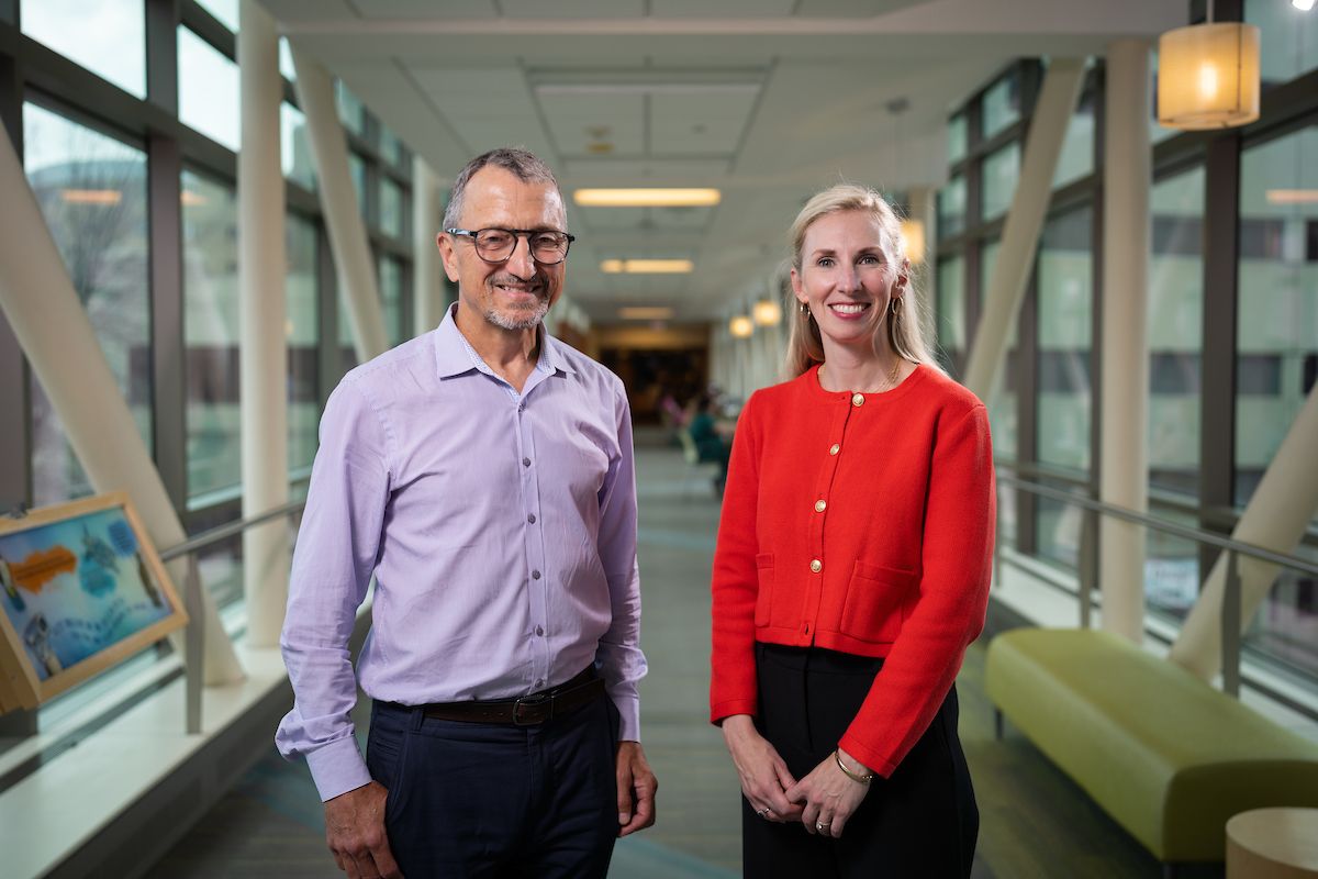 Gillette orthopedic surgeon, Tom Novacheck, MD, and Gillette manager of clincial transformation, Andrea Bushaw, PhD, in the Gillette Children's skyway.