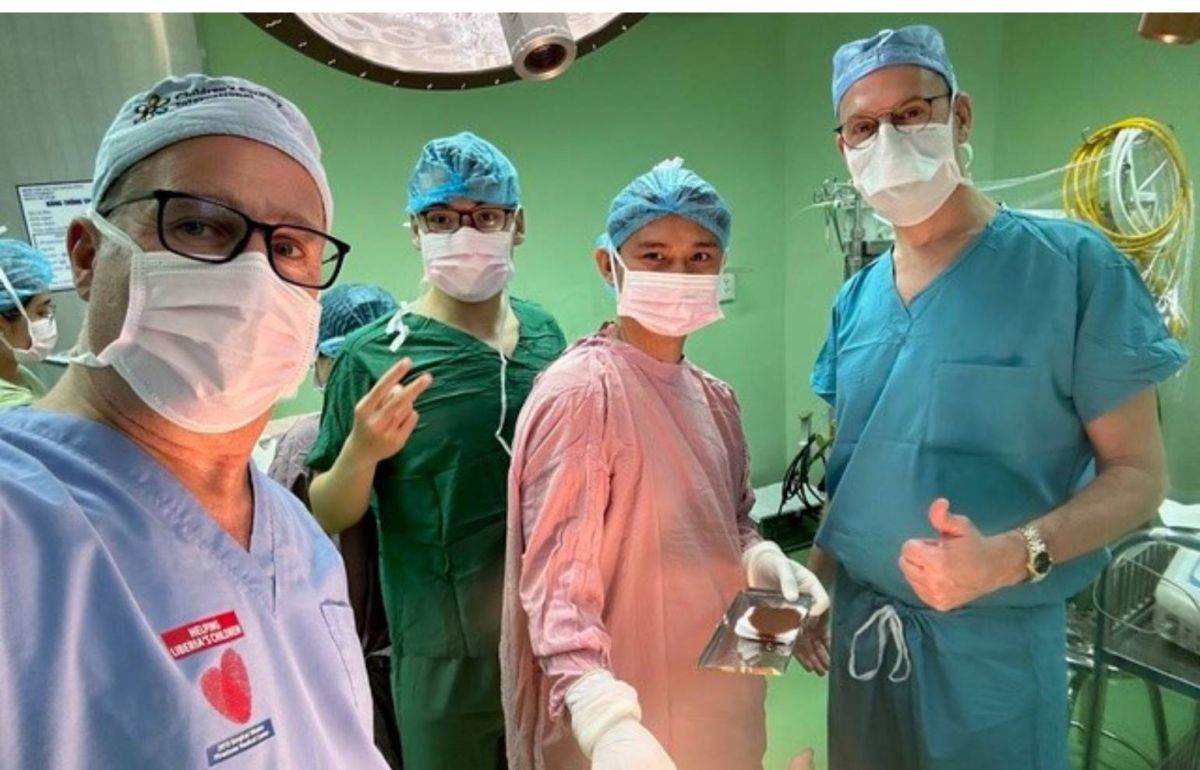 Gillette pediatric urologist, David Vandersteen, MD, with his Vietnamese colleagues in the operating room.