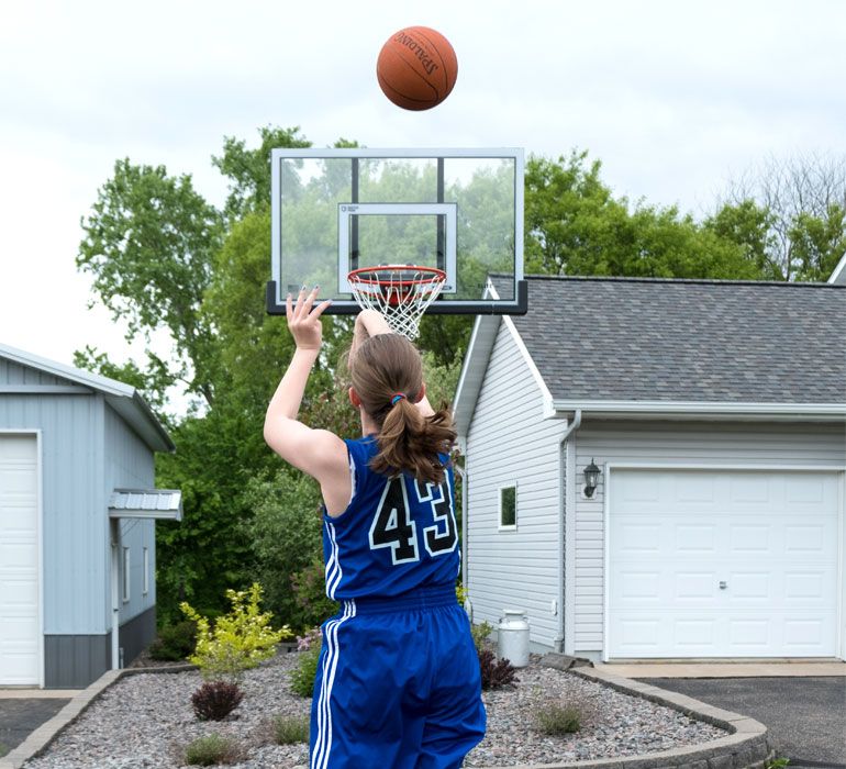 Erika, a skilled basketball player, has scoliosis.