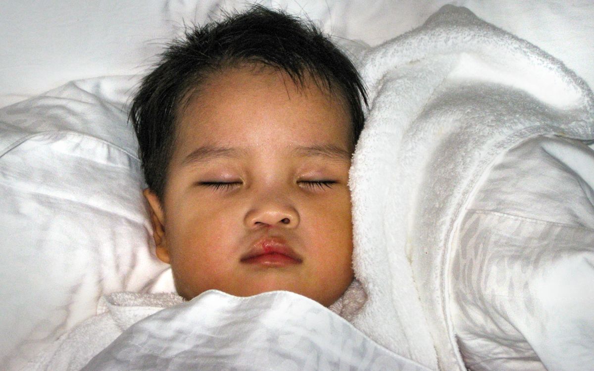 A beautiful child sleeps peacefully