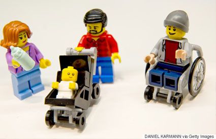 LEGO toy figure that uses a wheelchair