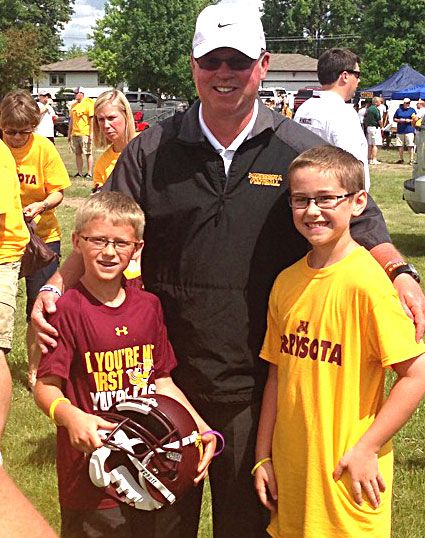 Nick Winge and his brother are pictured with Coach Jerry Kill, who also has epilepsy. 